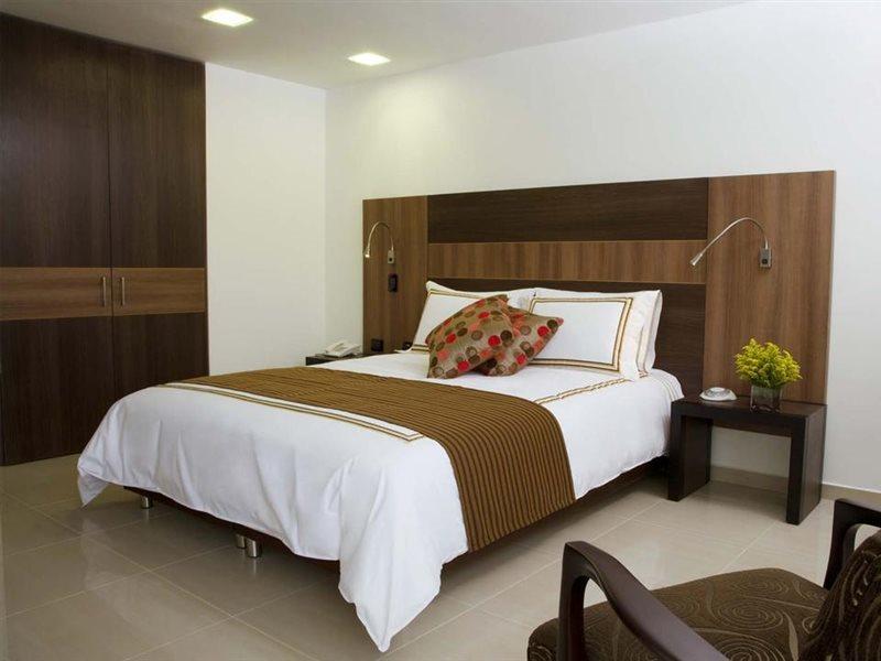 San Simon Hotel Pereira By Soratama Zewnętrze zdjęcie A bedroom