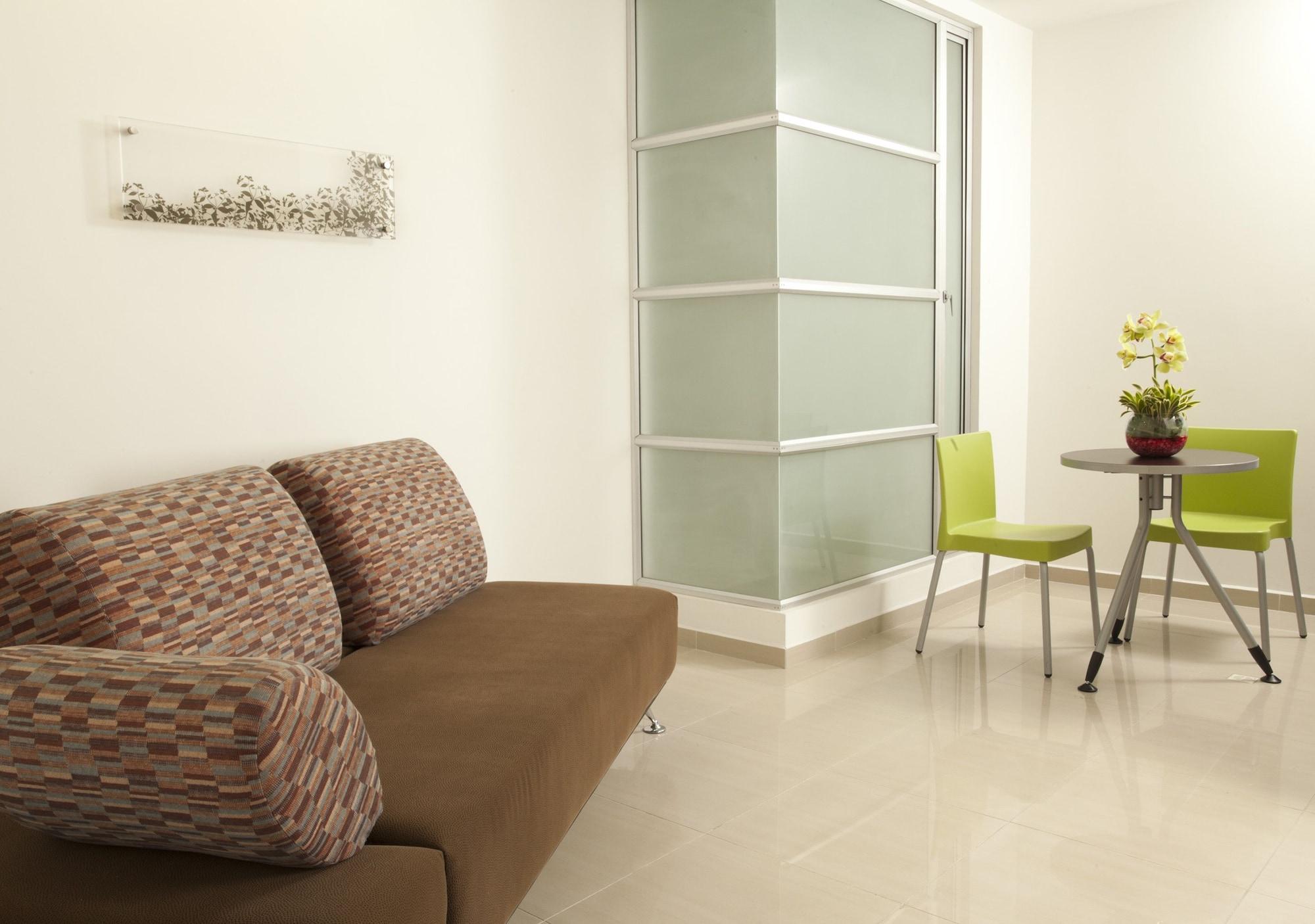 San Simon Hotel Pereira By Soratama Zewnętrze zdjęcie A room with a vinyl floor